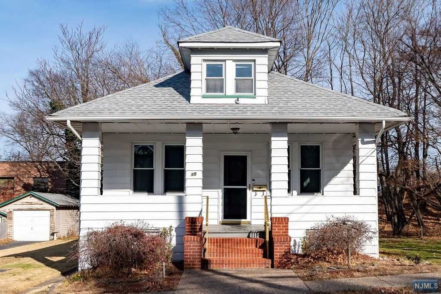 Lovely, well maintained ranch home. Charming wood trim through out the house. High Ceilings, HW floors. Large walk up Attic that can be finished. Full basement, also has possibilities. Has mature grape vines in the back yard for the enthusiast! Newer HW heater. updated furnace and electric. So much potential!!!!