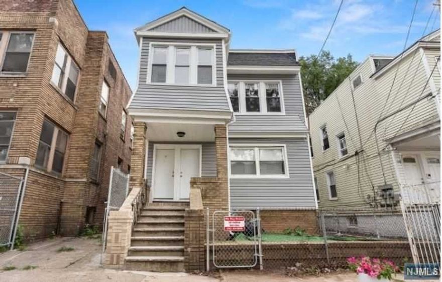 Awesome income generating property. Features 7 bedrooms 3 full baths with a partially finished basement. This property also has a garage and driveway. Close to shopping, public transportation, highways and parks.