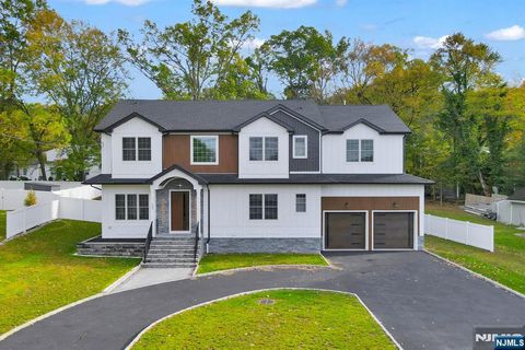 Photo of 153 E Cedar Street, Livingston, NJ 07039 (MLS # 25034054)