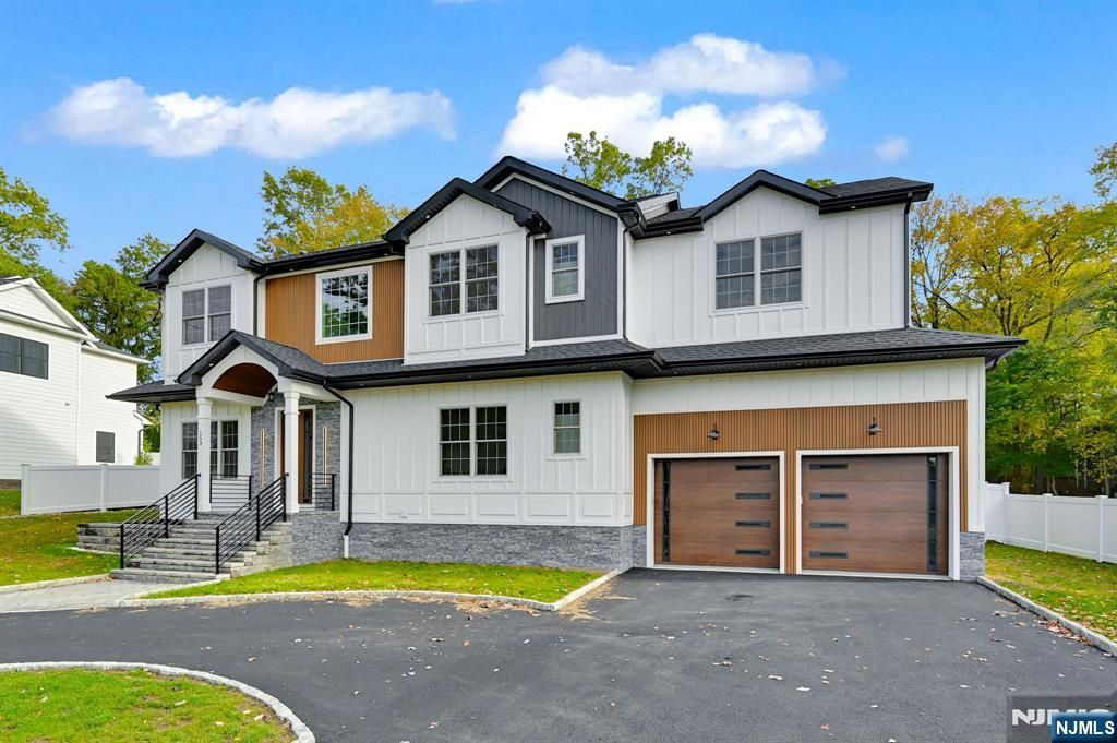 Photo of 153 E Cedar Street, Livingston, NJ 07039 (MLS # 25034054)