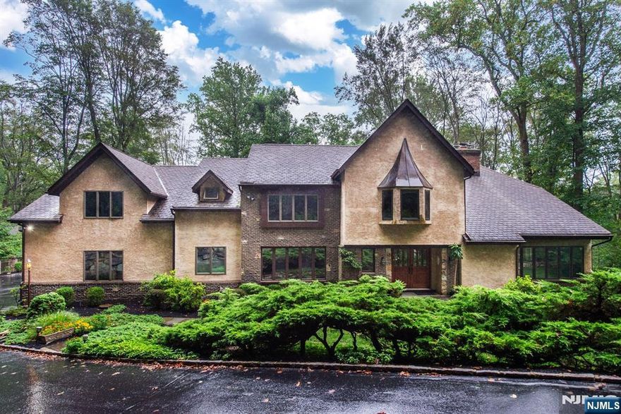 Welcome to 133 Rippling Brook Way! Drive into the Cul-de-Sac,down the private driveway and be impressed by this Spectacular 6 Bedroom home that sits on the most beautiful 3+ Acre lot. offering plenty of space and privacy. This combination of 5,000+ Sq ft,consisting of a 23X22 Master Bedroom Suite addition that has an attached office/sitting room, 2 Walk in closets.Gas fireplace,2 small sitting areas, and a Balcony overlooking the lucious gardens that are meticulously cared for, also features 3 Additional spacious second floor Bedrooms and Full bath, 2020 Renovated kitchen,Sunken Family room,Living room w/Vaulted ceiling,Sun Room boasting 4 Skylights,First floor bedroom ,Formal Dining room,Full bath,22X14 Deck w/motorized awning,3 Car garage,Full unfininished walk out basement make this home the perfect blend of Luxury and Comfort .As well as a Full house generator,new hot water heater,AC,furnance,septic,reverse osmosis system,additional 4th garage/shed.