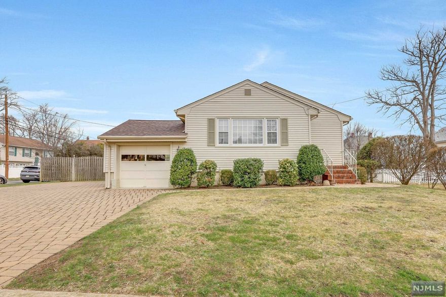 Located in a quiet neighborhood, close to EVERYTHING & only one block from downtown! Enjoy summer walks to the local restaurants! This Immaculate Ranch-style home has a fully finished basement for the best of both worlds...one floor living with 3 bedrooms and bright updated Full Bath, eat-in Kitchen and light-filled Living Room on main floor...and a walk-out, tiled Basement with HUGE Rec Room, Dining Room and full Summer Kitchen! Ideal for entertaining and overnight guests with Powder Room as well! Original hardwood floors throughout main level (under carpet). Lovely level property with large storage shed. One-car garage and oversized paver driveway adds upgraded curb appeal. EXCELLENT regional school district and easy commuting. Shows Pride Of Ownership. This house won't last at this price! HURRY !