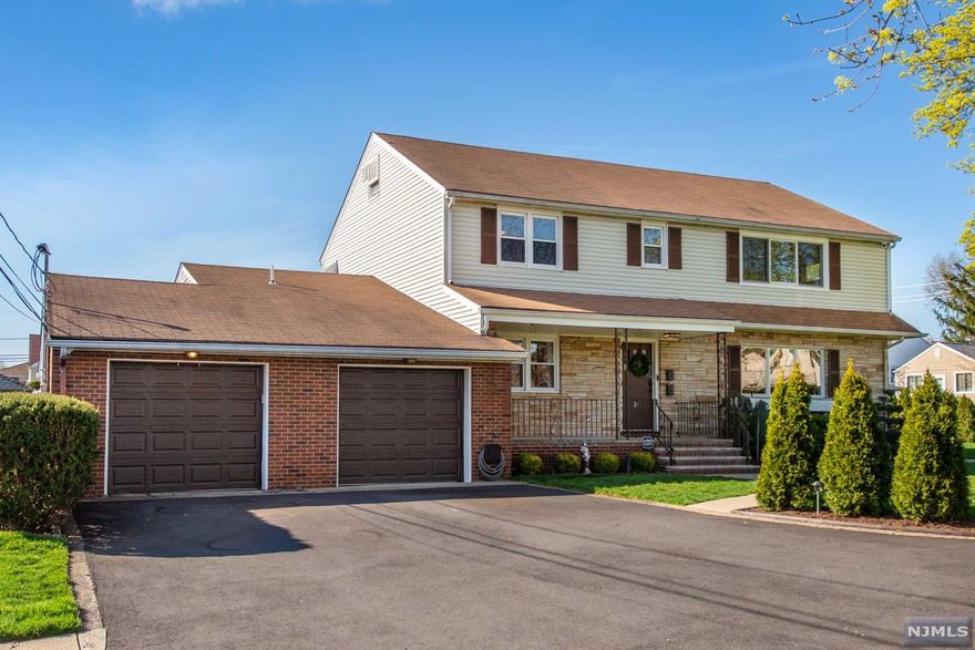 An oasis in Clifton!!! Fall in love with this stunning Clifton home on end of inviting cul de sac. This bright and sunny 2 family home (easily converted to a 1 family) was just renovated and true pride of ownership shines through. Features include beautiful built ins, gas fireplace, granite and quartz counters, high end stainless appliances, spacious closets, wood floors, stunning yard with patio perfect for entertaining. Central A/C, double car garage and much more!