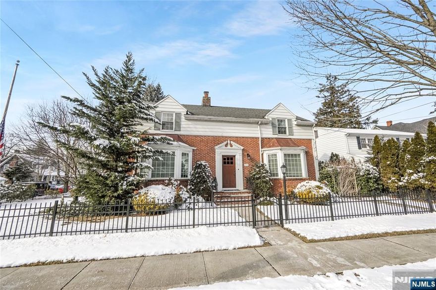 Discover timeless elegance in this Center Hall Colonial located on a desirable corner property in the heart of Rutherford. First Fl offers: A large living room with a wood-burning fireplace, formal dining room, updated eat-in kitchen, family room off the kitchen, large bedroom with double closets (currently set up as family room/ office), and a powder room complete this floor. Second Fl features: Two generously sized bedrooms with excellent natural light and storage, full bathroom with a tub and separate standing shower. Additional amenities: Fully finished basement with a family room, full bath, laundry area, sauna, and utility room. Two-car tandem attached garage, ductless split wall A/C system for efficient cooling, gas heating, gleaming hardwood floors throughout the home. Conveniently located close to all amenities, this home offers easy access to schools, shopping, dining, and public transportation. Don't miss the opportunity to make this stunning property your forever home!