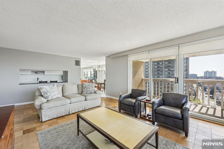 Sun Drenched Corner Unit with Stunning NYC and Meadowlands Views. This luxury unit located in the Mediterranean Towers is bright and spacious, featuring 3 bedrooms and 2 baths. Enjoy breathtaking views of NYC from your expansive private terrace, perfect for relaxing or entertaining. This beautifully appointed home features California closets for ample storage, custom electric shades, and an open, airy layout filled with natural light. Laundry room is located on every floor. Residing in the Mediterranean Tower means resort style living with top tier amenities including: 24 hour doorman, Olympic size swimming pool, wading pool, fitness center, basketball and tennis courts. A commuters dream with New York City Express Bus leaves from the parking lot as well as easy access to George Washington Bridge. Don't miss this incredible opportunity - schedule a private tour today!