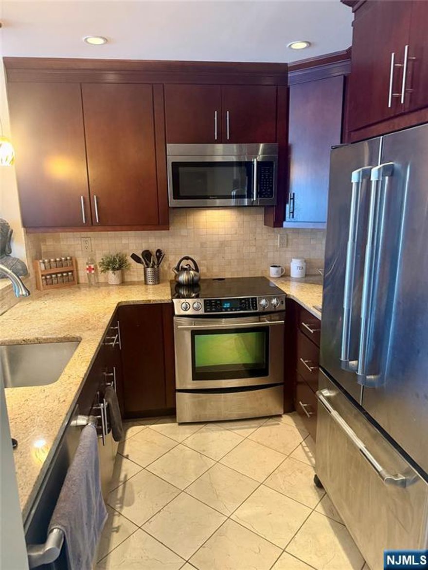 Independence Harbor- Great opportunity to live in this beautiful waterfront condo with a large paver patio (approx. 300 sq. ft.) and unobstructed North views of NYC. This unit is one of only a few waterfront 1 bedroom units with a patio on the Hudson River waterfront. Unit has a kitchen with Jenn-Air SS appliances, granite counter tops and marble floors. Bathroom boasts designer marble vanity, marble floors, walls & Kohler fixtures. Great closet space including a large walk in closed in the bedroom. All solid oak hardwood floors. Washer /dryer in the unit. 1 deeded indoor parking space included. Low taxes and maint. Included in maintenance: water, pool/hot tub, gym, tennis court, clubhouse & 24 hour gatehouse .. all in this wonderful pet friendly community. Bus to NYC & Ferry stops at complex entrance. A great place to call home!