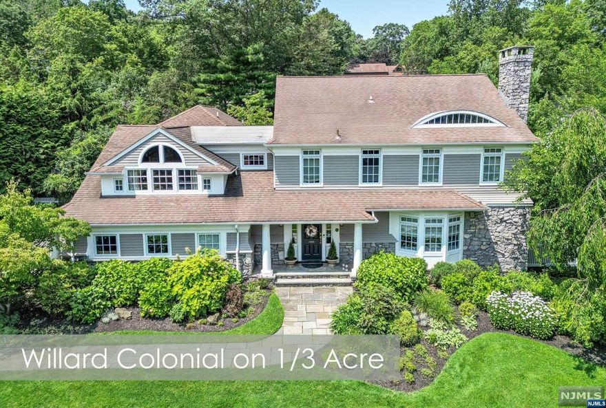 Pristine 4BR, 3.5 Bth Colonial in Ridgewood's top rated Willard school district, close to NYC bus/train, perfect blend of classic architecture and modern living. Great flow w/lrg Entrance Foyer, DR overlooking manicured yard. Recently renovated Kitchen, top-of-the-line appliances, Bfast bar, Butler's pantry, Mudroom w/laundry and access to driveway. LR w/fireplace, built-ins, Lrg. Den with built-ins. Sun-filled family room, Dutch oven flanked by sliders, leading to the backyard oasis. 2 primary suites with en-suite baths on the 2nd Fl., one with elaborate moldings, bedroom, sitting room w/fireplace, lrg walk-in, Bath. The other w/vaulted ceilings, exposed beams, custom Off. built-ins, bath. 2 add. BRs, well sized, built-ins, crown moldings, recessed ceiling, shared bath. Full basement waiting to be finished with high ceilings. Enjoy the backyard oasis, alfresco dining beneath the pergola, drinks in front of the outdoor fireplace, 2-story playhouse and hot tub. Built to impress!