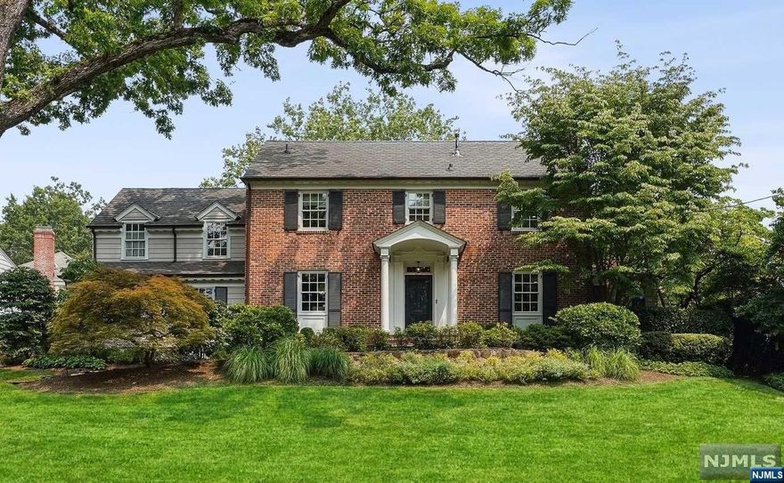 Renovated 5 en-suite Bedroom +2 Half Bathrooms custom colonial in Old Short Hills located in the coveted Knollwood section -a few blocks to midtown direct. Spread across 4 levels, recent upgrades and renovations include: Kitchen expansion, renovated bathrooms, new Mudroom, 2nd floor laundry room, updated gas fireplaces, extensive hardscaping and landscaping, newer Pella windows + newer HVAC system. Living Room with access to Sunroom / Office. Eat-in Kitchen with granite countertops, high-end stainless steel appliances + large island, new walk-in pantry. Breakfast area has access to new patio +level yard. Open concept Family Room. New Mudroom connects to 2-car garage. 2nd level with 4 bedrooms (all en-suite + renovated); Primary Bedroom with 2 walk-in closets +Bathroom with shower, soaking tub, dual sink; Laundry Room +study area. 3rd level with 5th en-suite Bedroom +Media Room +Workspace. Lower Level with Rec Room, Home Gym / Music Room, Storage + Powder Room.