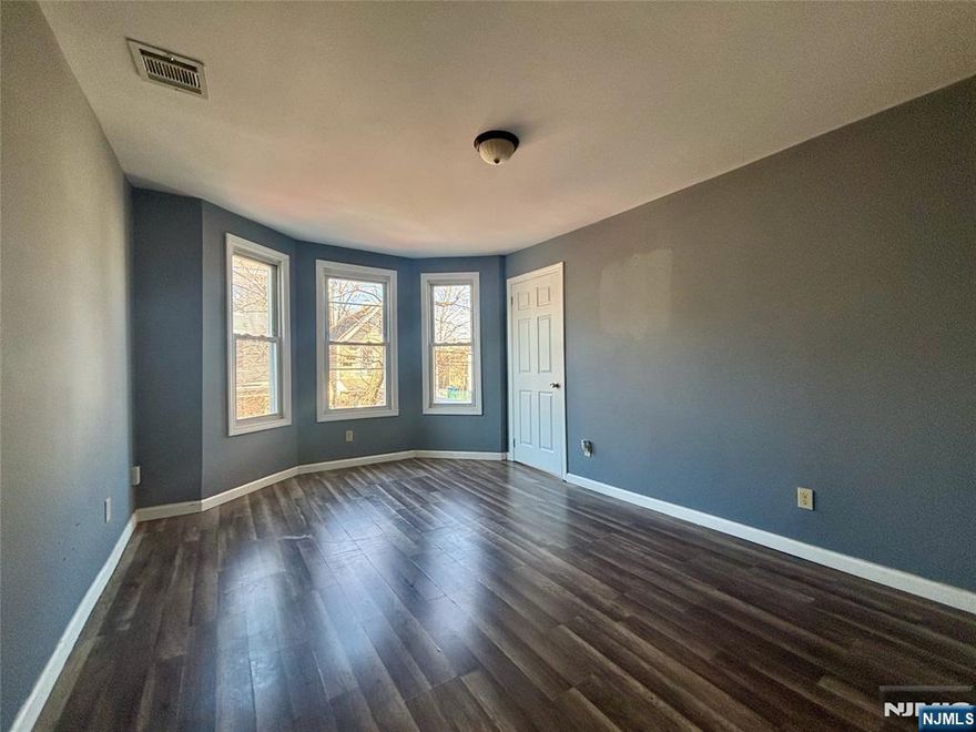 SPACIOUS AND NEWLY RENOVATED!! Second-floor apartment in the heart of Newark! This 4-BEDROOM, 1-bath residence was fully renovated in 2024 and offers a modern, comfortable living experience with generous room sizes and abundant natural light throughout. The updated kitchen and bathroom feature contemporary finishes, while the layout provides flexibility for bedrooms, home office, or additional living space. Conveniently located near public transportation, major highways, shopping, dining, and local amenities. A great opportunity for those seeking space, style, and accessibility in a prime Newark location. Move-in ready and available now schedule your private showing today! For showings, Please contact Juliana 973-606-8258.