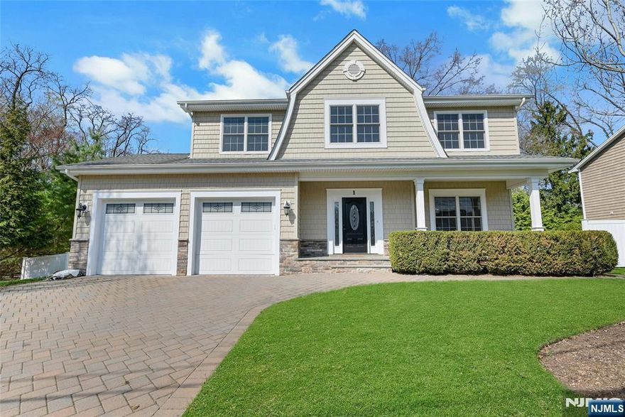 This front porch 4 bedroom, 3.5 bathroom, 11 year old colonial home in Old Tappan offers luxury living in a prime Bergen County location. The first floor boasts a formal living, powder room, and a large eat-in gourmet kitchen, open concept floor plan, Kitchen flows to cozy family room with wood-burning fire place with access to the paver patio and fenced back yard with evergreen trees for all year round is perfect for entertaining. The second floor features a primary suite with soaking whirlpool, and sep. shower, plus three additional bedrooms and a full bathroom with laundry room on this level. Fully finished basement with full bath, hardwood floors throughout on main floors. Located in a prestigious neighborhood with top-rated schools, parks, shopping, and dining nearby, this house is a rare rental opportunity in Old Tappan!