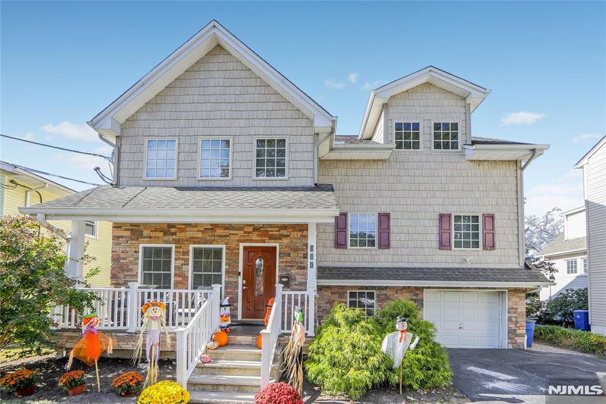 This home, a testament to fine craftsmanship, was masterfully reconstructed in 2009. Enjoy the serenity of a quiet, dead-end street from your front porch. The heart of this open floor plan home is the gourmet kitchen, w/ center island, granite countertops, dbl ovens, wine refrig.,seamlessly integrated, the kitchen flows into the sun filled great room,w/a stately stone frpl & sliding glass doors,leading to paver patio & fenced in yard. The 1st floor, offers 9-ft ceilings, recessed lighting, detail trim work. Ascend upstairs to 4 BRs & BA, plus the expansive primary BR suite, designed to accommodate a sitting area, features custom closets, striking beam accentuating the vaulted ceiling, a spa-like bath w/a dbl vanity,shower, & Jacuzzi. The newly finished heated bonus rm offers many options. The partially fin lower level provides gym, laundry, powder rm, utilities & storage. Generator. This home offers comfort & style, close to schools, shopping, & convenient NYC commute. Come fall in love.