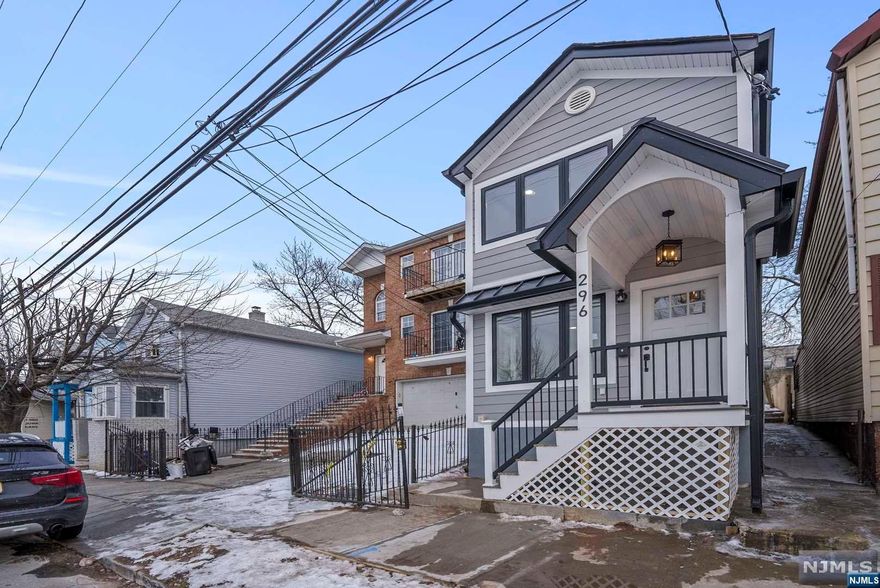 WELCOME TO THIS COMPLETELY GUT RENOVATED SINGLE FAMILY HOME IN THE HEART OF NEWARK, NJ. THE PROPERTY BOASTS 6 ROOMS, 2 BEDROOMS, 2 FULL BTH & 1/2 BTH. ENTER INTO THE FIRST FLOOR AND YOU'LL BE GREETED WITH AN OPEN CONCEPT LIVING ROOM EQUIPPED W/ GAS BURNING FIREPLACE. THE KITCHEN IS OVERSIZED WITH CENTER ISLAND, QUARTZ COUNTERTOPS, SOFT CLOSE CABINETS AND SS APPLIANCES. THE SECOND FLOOR, CONTAINS 2 OVERSIZED BEDROOMS AND 2 FULL BTH. THE BACKYARD IS FULLY FENCED IN AND PERFECT FOR ENTERTAINING YOUR GUESTS. ADDITIONAL FEATURES:BASEMENT IS FULL AND FINISHED, CENTRAL AIR AND FORCED AIR, LOW TAXES.