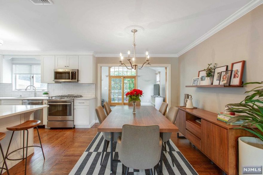 Spacious & Recently Renovated Split Level with Cathedral Ceiling Great Room Addition..Incredible Ken Bauer Kitchen with Breakfast Bar, Beautiful Cabinetry to ceiling..Stainless Appliances, Quarzite Counters opening to Formal Dining Room & Cathedral Ceiling Family Room w/Skylights & Palladian Window..Large Deck off Family Room which has a cathedral awning..Spacious Living Room with full wall Fireplace and exquisitely finished stained hardwood floors..Updated Baths..Spacious Bedrooms..Newer windows, furnace..Enter and you will FALL IN LOVE!! Close to the picturesque town Center and NYC bus and Rail! Spacious rear yard for fun and relaxation..Just very special inside and out!! Recently Fenced in Expansive Yard! Brand NEW on the Market!! The home offers gas heat & central air conditioning, and offers a unique opportunity for those looking for location close to the Town Center, while still having amazing property and being located on a beautiful residential street. Incredible Value!