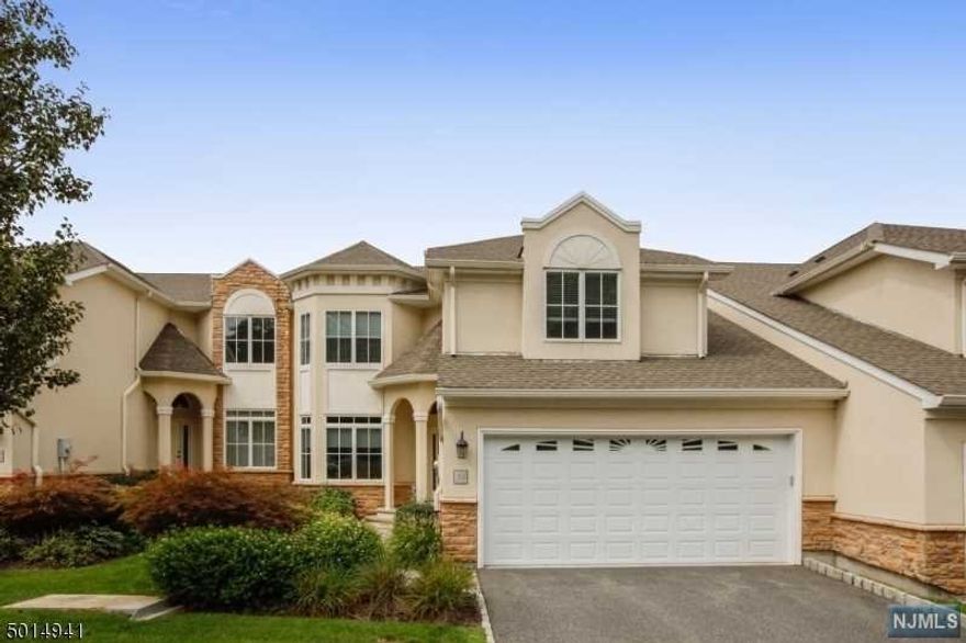 Exquisite custom home--Enter this posh gated community to this custom nestled town home on cul-de-sac. Enter into stunning two story entry & modern open floor unit. You are greeted w/gleaming HW floors that lead to elegant open DR or opulent great room that is open to gourmet Chef's kitchen w/custom cabinets, Granite, SS appl., center island, sep breakfast area that opens to huge private deck w/wooded view--perfect for entertaining. A convenient elevator that leads to all levels. The upper level features open stair case w/gracious master suite w/sitting area, two custom WIC & spa like custom bath w/dual over sized vanities & shower stall. Two additional en-suite bedrooms complete this level. The LL offers huge open Family room w/full bath, laundry & storage. Vizcaya is the ulitmate in resort living!