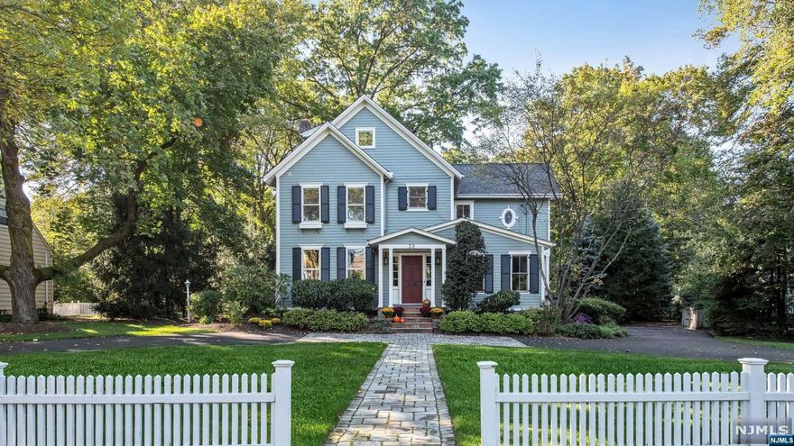 Pristine Farmhouse Colonial on exceptional 0.8 acre deep, level lot, just steps from Somerville ES, RHS, NYC transit, Duck Pond, and downtown Ridgewood. Discover the perfect blend of classic charm and contemporary living in this expanded and updated quintessential Ridgewood home w/ 4,000 sq (+basement) of tastefully designed living space. 9' ceilings greet, creating an open and airy ambiance. The heart of the home is the crisp white kitchen, a chef's haven w/ large center island and breakfast area, open to a generous fam rm. Formal din rm, liv rm, home office, mud room and 1/2 bath complete this level. Ascend the front or back stairs to the primary suite w/ spa-like bath and generous WIC. 2 addt'l bedrms, bath and laundry complete the 2nd floor. The 3rd floor ensuite bedrm is ideal for teens or guests. Finished basement offers space for a rec. room and gym/2nd home office. Don't miss the basketball court behind the charming turn-of-the-century barn. Your dream home awaits!