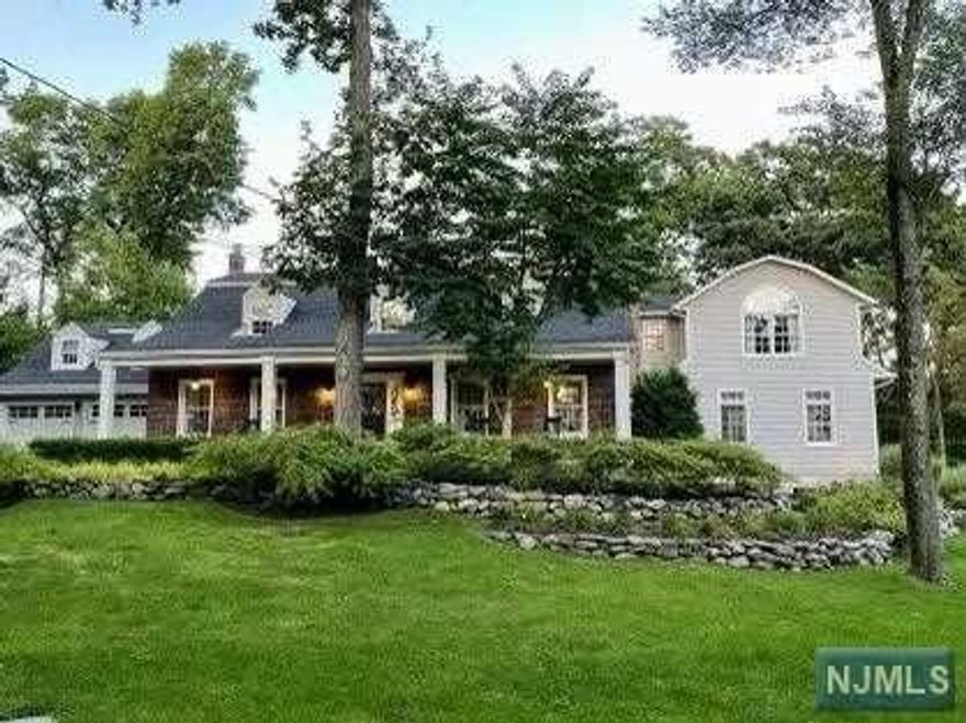 One of a kind pristine home in the desirable Chestnut Ridge area of New Jersey. Gorgeous, professionally landscaped 2.04 acre level property. A picturesque center hall colonial in move-in condition. The main floor boasts a fully-renovated EIK with radiant heated floors, Viking appliances, JennAir refrigerator, formal Dining room and large formal Living room with WB fireplace and half bath. The grand yet cozy Great Room adds the finishing touches to this impressive main floor. Upstairs find the generous Master Suite with a newly renovated Master bathroom and custom closets, floor-to-ceiling windows and a custom built-in wall unit, 3 more bedrooms, 2 updated full bathrooms plus laundry fitted w/Maytag W/D. Finished basement with gorgeous wood-planked ceilings, WB fireplace, custom-built entertainment center, bonus room, and full bathroom. New outdoor Kitchen w/new Trex decking and additional private side patio. MUST SEE with LOW TAXES!!