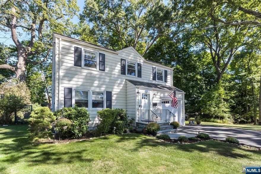 Welcome to 9 Clover Lane in Verona, NJ! Step inside to discover a spacious layout featuring a welcoming living room, a versatile dining area, and a kitchen ready for your personal touch. This charming colonial-style home offers an open floor plan, a cozy living space, and convenient powder room on the first floor. Large windows throughout the home fill it with natural light, creating a bright and inviting atmosphere. Upstairs, you'll find three generously sized bedrooms and a renovated hallway bathroom. The backyard is a blank canvas for your creative ideas, featuring two levels of composite decking and a patio area perfect for a fire pit. Whether you're entertaining guests or simply relaxing, the ample outdoor space provides endless possibilities. Additionally, the home is equipped with a generator switch box for added convenience. Enjoy Verona Park, Verona Community Pool, and a charming downtown area, along with easy access to NYC transportation & Montclair shops & restaurants.