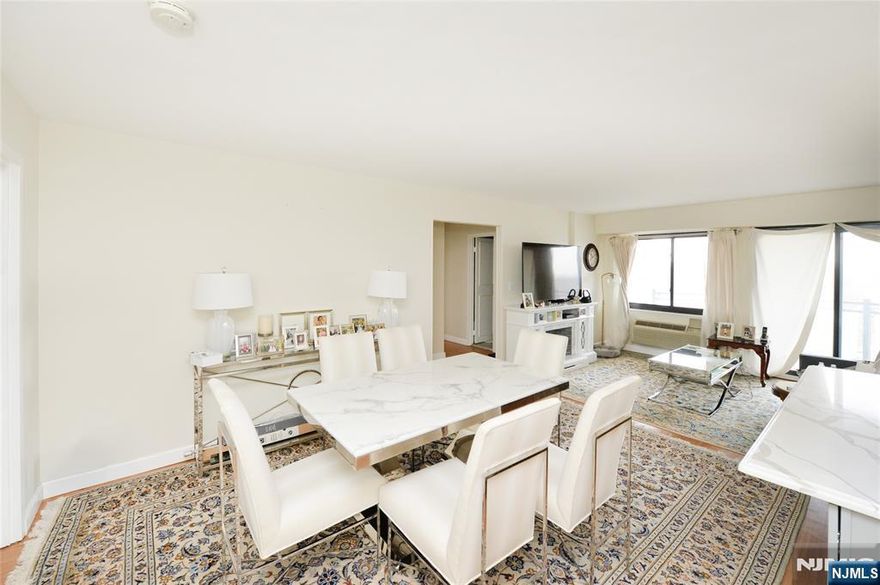 Welcome to The Sherbrooke, a highly regarded full-service co-op located on prestigious Prospect Avenue in Hackensack. This bright corner 2-bedroom, 2-bath residence on the 10th floor offers stunning dual exposures with sweeping NYC skyline views and beautiful sunset vistas. Enjoy indoor-outdoor living with your own private terrace, perfect for morning coffee or evening relaxation above the treetops. The home features an open-concept layout with a redesigned kitchen that flows seamlessly into the living and dining areas, highlighted by a large center island with a premium stone countertop, ideal for both everyday living and entertaining. Additional highlights include spacious room sizes, abundant natural light, and thoughtful updates throughout. The home has been freshly refined with smooth ceilings (original popcorn ceilings removed), enhancing the clean, modern feel. The second bedroom features brand new carpeting, and the primary bathroom has been tastefully updated, adding both comfort and style. The Sherbrooke offers a full-service lifestyle with a 24-hour doorman, security, and a beautifully maintained community pool. Monthly maintenance includes property taxes, heat, hot water, and common area maintenance, offering excellent value for a full-service building. Ideally located near shopping, dining, and major transportation options with easy access to NYC, this home combines space, views, and accessibility in one of Bergen Countyâ€™s most desirable locations.