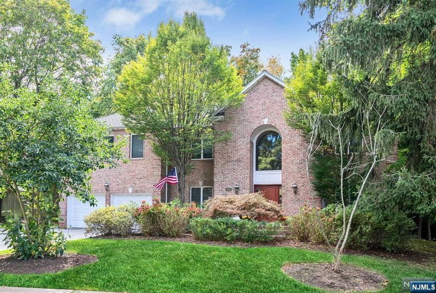 Welcome to this stunning East Hill 5-bedroom, 4.5-bathroom Center Hall Colonial, crafted by the esteemed local builder, Distaulo. You will love the layout, spacious rooms & airy feel of the home. As you enter, you are greeted by a two story entry foyer leading to the gourmet eat-in kitchen with breakfast area & island and seamlessly connects to an inviting family room, complete with a cozy wood-burning fireplace, making it the heart of the home. A versatile 1st-floor bedroom and full bath serve as a perfect guest suite or home office. Upstairs, discover 4 spacious en-suite bedrooms, including a luxurious primary suite featuring 2 walk-in closets & spa-like bathroom for ultimate relaxation. The expansive basement, with its high ceilings, offers endless potential for customization. Step outside to the private paver patio, perfect for entertaining, and a backyard ideal for play. Conveniently located near Closter's downtown shops & restaurants, schools, parks and NYC transportation.