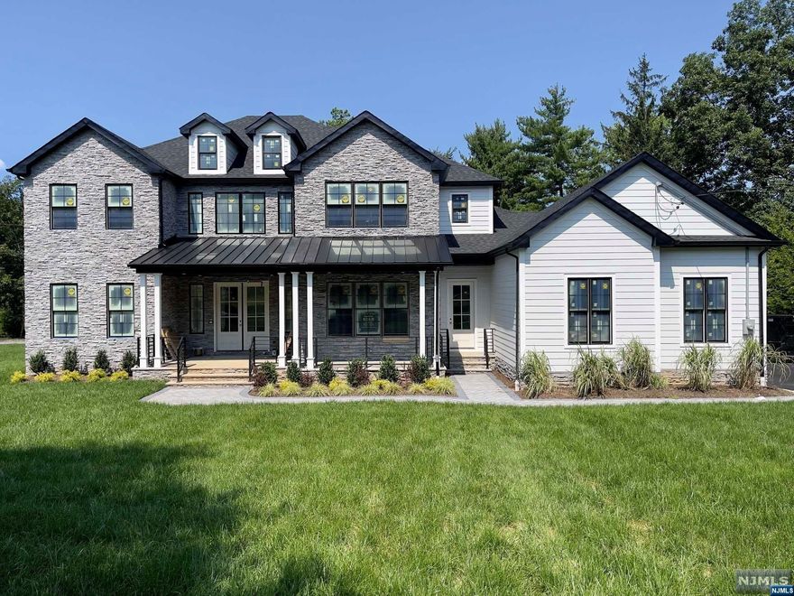 NEW CONSTRUCTION! Gorgeous 5 BD, 5.5 BA with 3 car garage is located in the PRESTIGIOUS RIKER HILL section featuring 6,861 sq ft of custom living space on 3 floors. Enter the 2-story foyer w sweeping staircase flanked by a formal LR & DR w extensive Millwork and custom coffered ceilings. Rich HW floors lead to expansive kitchen w additional Dinette seating surrounded by sun-drenched windows, Family Room w Fireplace w tile surround & decorative mantle; sliders to large deck overlooking the lush backyard. Kitchen is complete w high-end SS appliances, huge center island, quartz counters, custom cabinetry, walk-in pantry and butlers pantry with custom cabinetry. 1st-floor en-suite, powder room, and custom mud room complete the 1st floor. The 2nd floor is home to 4 beds w Primary ensuite designed w tray ceiling, extravagant walk-in closet & spa-like bath w soaking tub, stall shower & dual sinks, 2nd bed en-suite, and two additional spacious bedrooms!