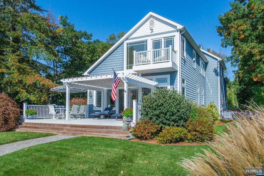Pristine one-of-a-kind lakefront completely renovated & beautifully furnished. Picturesque Storybrook home on Pioneer Point on Culvers Lake. Flat lot with mature landscaping and a permanent dock with a large deck. The open-plan concept and primary suite with spa bath are adjacent to an open seating area with a 2nd-floor balcony. A full-house generator, electric car charger, all new appliances, all new flooring & bathrooms are just a few of the new improvements done in 2023. The gas fireplace & built-ins in the family room and all new painting & lighting complete the renovation. This is a turn-key move-in residence and all furniture & furnishings are available for sale as well. New members are required to pay an initiation fee of $2,665.63. There is an annual membership fee due in April of each year. 2023 dues were $1,119.56 and vary each year depending on assessments.