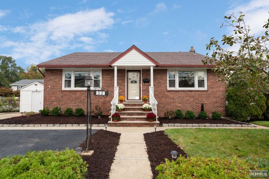 Open layout, Living room, Dinning open to updated kit w/granite counter tops & island, spacious Fla Rm w/skylights,3BR,updated FullBath Huge fin.bsmt with steel beam construction,with living room, full bath/soaking tub,laundry, storage room and walk out to fully fenced-in yard & private patio. Newer C/AC, roof, windows water heater and H/W flooring,Radiator Heat. This lovely move-in condition home is beautifully landscaped, parking for 3 to 4 cars. It is conveniently located near schools,park & transportation and offers easy access to several major highways-French drains installed as a precaution. Don't Miss this house !! All offers in contract form w/pre-approval.