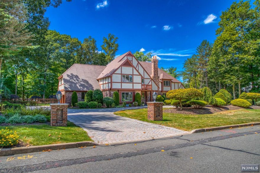 Exquisite and Unique with Elegance and Charm, this 6 bedroom, 4.5 bath Colonial home in Franklin Lakes is just what you are looking for! This spacious home, with over 5,600 sq ft living space on 1.07 acres, is located in a multi million dollar neighborhood of Franklin Lakes. You will fall in love with the curb appeal of this home and you will appreciate all the great interior spaces. Built in 1984, this home features beautiful hardwood floors throughout, custom painted walls with painted deco, recently renovated huge gourmet kitchen with sun-filled Breakfast Area, two story great rm with lots of tall windows and a woodburning fireplace,living room with a gas fpl,formal dining rm and junior suite brm/office with a full bath completes 1st fl.Upstairs, you will find a primary suite, hallway bridge w/den, junior suite,3 bedrooms and renovated fbth. It also features full finished basement, heated pool w/jacuzzi, circular driveway, 3 car attached garage, Schedule your private tour today