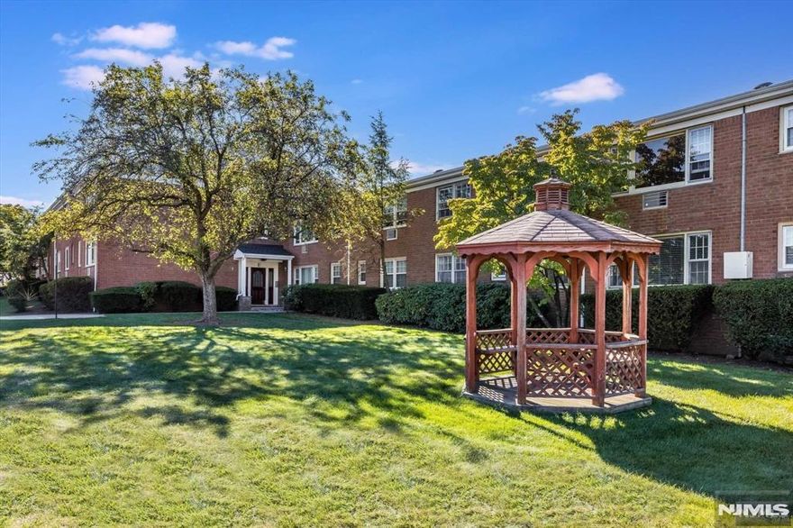 This spacious 1 Bed/1 Bath condo in Montclair Heights section of Clifton combines comfort and convenience. This unit features great flow, hardwood floors, a huge bedroom, and great outdoor space.The kitchen offers a gas range, and easy access from the front hall, and adjacent dining room. Dining room built-ins, the living room closet, hallway closets and the basement storage unit will allow for easy and ample storage. Enjoy the grassy center courtyard, reading a book in the gazebo, or lounging by the pool. Convenient laundry facilities exist with interior access from the main hallway, with card payment system, and remote alerts technology. Come for the unit, stay for the location. You're so close to shopping, dining, and parks. Route 3, Rt 46, and the GS Parkway. NJ Transit bus to NYC stops just a block away, and it's only 1.6 mi to the nearest train station (MSU). This condo is ideal for those seeking suburban tranquility with urban excitement.