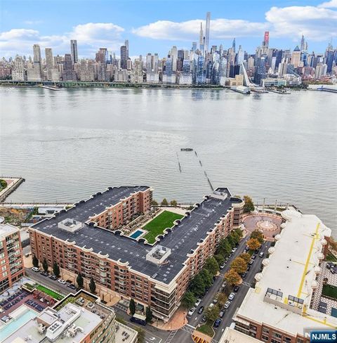 Photo of 20 Ave At Port Imperial #315, West New York, NJ 07093 (MLS # 25038484) Photo of 20 Ave At Port Imperial #315, West New York, NJ 07093 (MLS # 25038484)