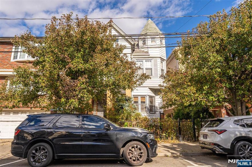 Beautifully renovated and spacious 2-bedroom apartment featuring a separate living room, dining room, and bonus den. Set in a charming Victorian-style home, this bright and airy residence offers tall ceilings, generous storage, and modern upgrades throughout. The renovated kitchen includes quartz countertops and stainless steel appliances. Additional conveniences include heat and water included, basement laundry, telecom access and security cameras, and a large backyard with pergola. Located just one block from Blvd East and minutes from shopping, dining, parks, and multiple transit options to NYC and nearby towns. Small pets considered. No smoking. 12-month minimum lease. Tenant pays electricity and gas (separate meters).