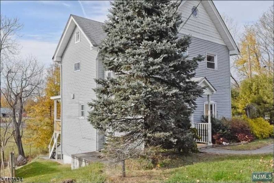 Come check out this great two family income property! First floor apartment has 1 bedroom, formal dining room, kitchen, living room (which could be made into a 2nd bedroom), 2 full baths, also this unit has a finished basement with 3 extra rooms that can be used for extra living space. The second unit offers a 1 bedroom apartment with an eat in kitchen, living room, bathroom and access to the walk up attic for storage. There are so many possibilities with this investment property, and it's close to public transportation and shopping! Sold As Is