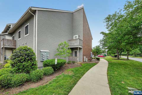 Photo of 601 Ravens Crest Drive #601, Plainsboro, NJ 08536 (MLS # 26020703)