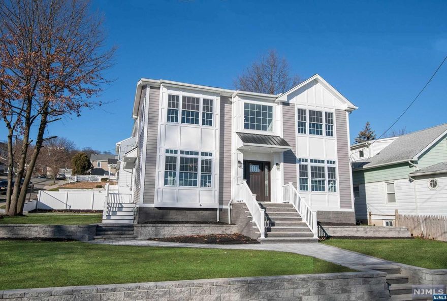 STUNNING NEW CONSTRUCTION HOME STEPS TO ALBION MEMORIAL PARK. STEP INTO THE TWO STORY FOYER AND YOU WILL IMMEDIATELY NOTICE THE ATTENTION TO DETAIL AND CRAFTSMANSHIP. HIGH END PANEL MOLDING ACCENTS SOARING CEILINGS AND THE OPEN CONCEPT LAYOUT. YOU WILL DEFINITELY ENTERTAIN IN YOUR CHEF'S CALIBER KITCHEN OVERLOOKING THE DINING AREA AND LIVING ROOM WITH FIREPLACE. TWO FIRST FLOOR BEDROOMS ARE PERFECT FOR HOME OFFICES, GUEST OR IF YOU HAVE LIVE IN HELP/ELDERS. UPSTAIRS THE PRIMARY SUITE BOASTS A VAULTED CEILING, DESIGNER BATHROOM AND A WALK IN CLOSET FIT FOR A KING/QUEEN. THE LARGE FINISHED BASEMENT HAS ANOTHER OFFICE/DEN ALONG WITH A REC ROOM ENTERTAINMENT SPACE WITH A CONVENIENT HALF BATH. OUTSIDE YOU HAVE HIGH END STONE WORK WITH A PAVER PATIO, PAVER DRIVEWAY AND NEW SOD ALL AROUND. NOTHING TO WORRY ABOUT JUST UNPACK AND LIVE THE GOOD LIFE.