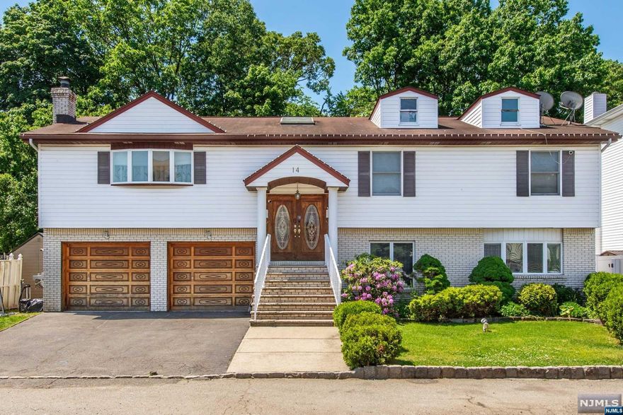 Welcome to your dream home! This spacious two-family residence offers the perfect blend of comfort and modern living, nestled on a quiet residential street. Boasting five generously sized bedrooms and 3.5 baths, this newer build is extremely ideal! Step inside to discover a bright and airy interior, highlighted by a master suite that features a private bath and a large walk-in closet. The property includes a two-car garage and a large driveway, providing ample parking. Enjoy the benefits of low taxes while living in a serene neighborhood that offers peace and quiet. With its thoughtful design and spacious layout, this home is perfect for personal living or rental income. Don't miss the opportunity to make this exceptional property yours!