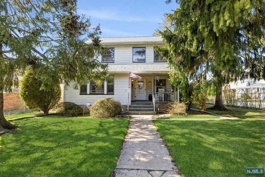 Wonderful two-family home in the center of thriving downtown Caldwell. Located on a large, picturesque, level, corner lot and just 1 block in from Bloomfield Ave, this charming 1920's era home has been respectfully cared for and continuously rented for the past 42 years. From the open front porch to the built-in book shelves by the fireplace in the first floor apartment, you can feel the history and pride of Caldwell within these walls. The first floor also includes a large kitchen with adjacent dining area, enclosed porch/den, 2 bedrooms and a full bath. The first level has use of the full, finished daylight basement, laundry and storage as well as backdoor access to the blue stone patio overlooking the private, completely fenced-in yard. The 2nd floor apartment is equally charming with Living Room, eat-in-kitchen, 2 bedrooms and full bath. The 2nd floor apt. has access and use of the floored, sun-filled, walk-up/stand-up attic with large windows.