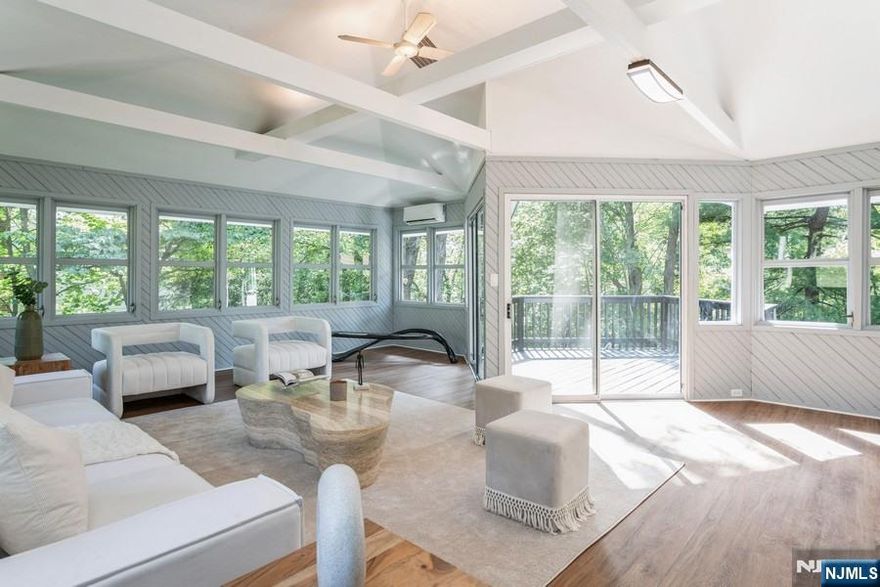 August 20 occupancy ..Sun-drenched and spacious 4 bedroom, 3 bath home in Demarest in beautiful condition. Home features an entry foyer, ,1 BEDROOM WITH A FULL BATH - NEW SHOER TO BE INSTALLED .FAMILY ROOM AND ACCSES TO 2 CAR GARAGE AND STEPS TO BACKYARD a few steps up leads you to very bright a Living room , vaulted ceiling, skylights and gas fireplace, formal dining room and generous sized eat-in kitchen with plenty of cabinetry, half an island and a glass door leading you into a huge family room with a deck. The new Primary Suite on the 3rd level is private with stunning spa-like bath, radiant heat and walk-in closet. The lower level is finished with family room, and laundry. This property features gleaming hardwood floors throughout, central A/C, 2-car garage, Blue Ribbon Schools and close proximity to NYC. Simply unpack and enjoy. Tenant is responsible for landscaping and snow removal. Pets ok .