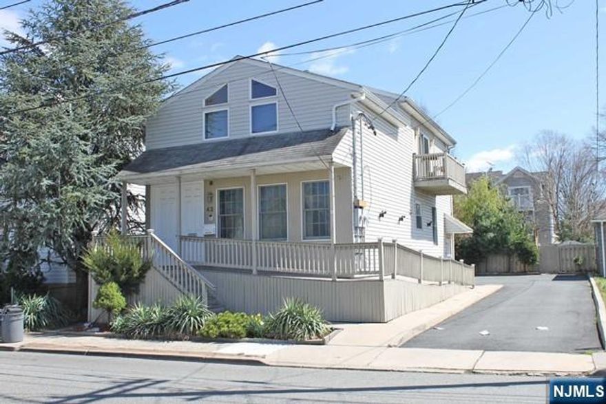 First floor apartment with a great location for NYC commuters. This apartment has a large open concept living room/kitchen area with tons of light. There are 2 additional rooms in the basement that can be used as a home office or storage. Laundry hooks up are available in unit or basement. 2 off street parking spaces available. Pets are conditional.