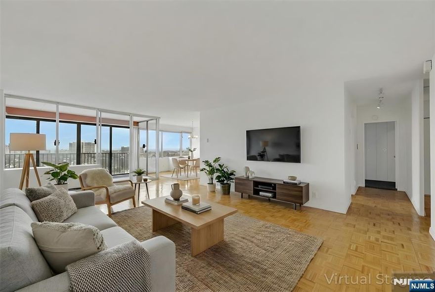 Welcome to Horizon House Towers, a highly sough-after co-op community in the heart of Fort lee. This spacious one bedroom deluxe residence offers approximately 1317 sq ft of living space with a terrace, providing exceptional room and comfort rarely found in a one bedroom home. The apartment features a generously sized bedroom, full bath, separate full dining room and a dedicated dressing area . Expansive windows showcase beautiful sunset views, filling the home with natural light and warmth The layout is ideal for both everyday living and entertaining. A primary garage space transfers with the sale of this unit-an invaluable convenience. Horizon House offers full service living- 24 hour doorman and security, Community Room ,Tennis and pickleball courts, Two outdoor pools, On site Convenience Store and more-Set on 28 Acres of landscaped grounds, the complex provides a peaceful park-like setting while remaining perfectly located for commuters-Come be a part of this vibrant community and enjoy comfort, convenience, and full service living- Board approval is required- Total monthly is $ 2564.00 which includes re tax, all util, cable/int, garage parking ,amenities and the capital assessment- Cash buyer needs to gross approx $124,000