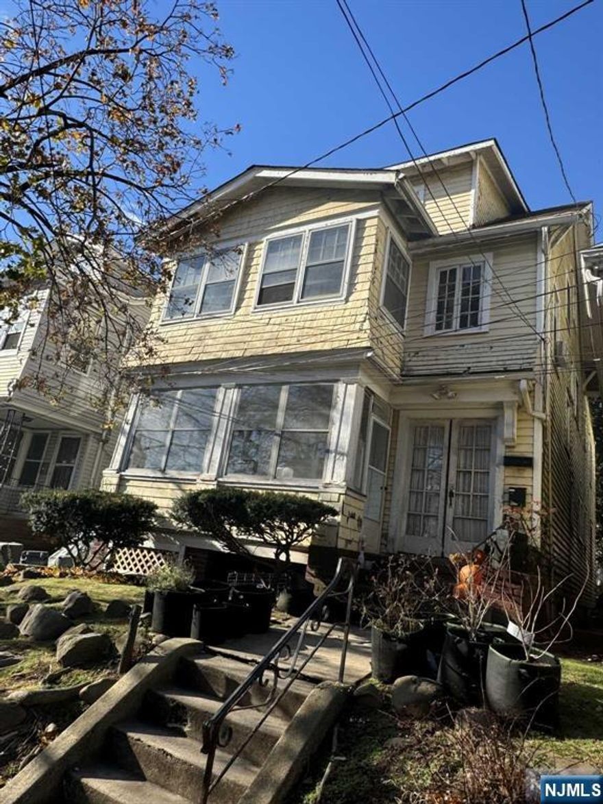 Large 3 family property being sold as-is.