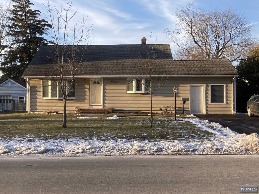 Wonderful Trilevel split w/ flexible floor plan. Two story LR, cozy kitchen w/solid wood cabinets, Jalousied porch, updated main bath, recessed lighting, replacement windows, vinyl siding, oversized outbuilding w/power. Spacious Family Room in process of renovation (needs sheetrock & flooring). FR leads to patio & fenced rear yard. Enjoy the fireworks display over the lake from your front yard! Best of all, check LP flood maps, not in "hatch marked" flood plain due to elevations in this area. There was no requirement for seller to carry flood insurance.