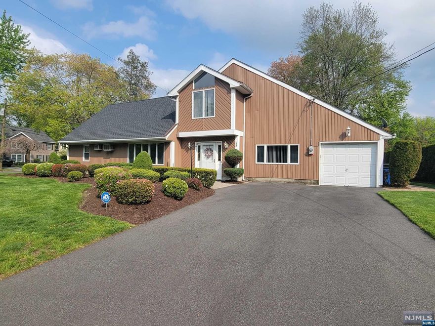 Welcome home to this beautiful expanded colonial! Surrounded by million dollar homes, this home features 4 bedrooms, with space for another! You'll find full bathrooms on each floor, as well as an attached 1 car garage! 1st floor features living room with wood burning fireplace, dining room, and separate family room! In the kitchen, you'll find newer cabinets with granite counter tops, along with washer/dryer! This home also features a huge loft space upstairs which can be used to your liking! Upon arrival, you will see beautiful mature landscaping, along with a paver backyard patio! Home also has back up generator! Please note- Decommissioned oil tank in front yard being removed by owner. 1st showings at open house April 30th 1-3.