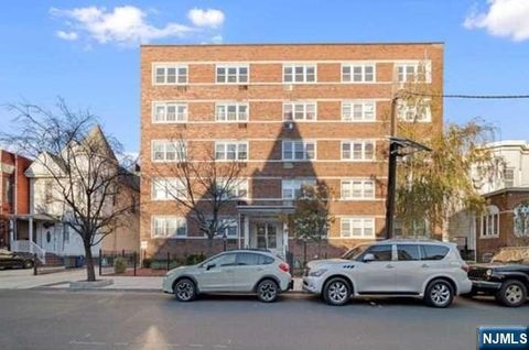 Photo of 154 Bowers St #402, Jersey City, NJ 07307 (MLS # 26007283)