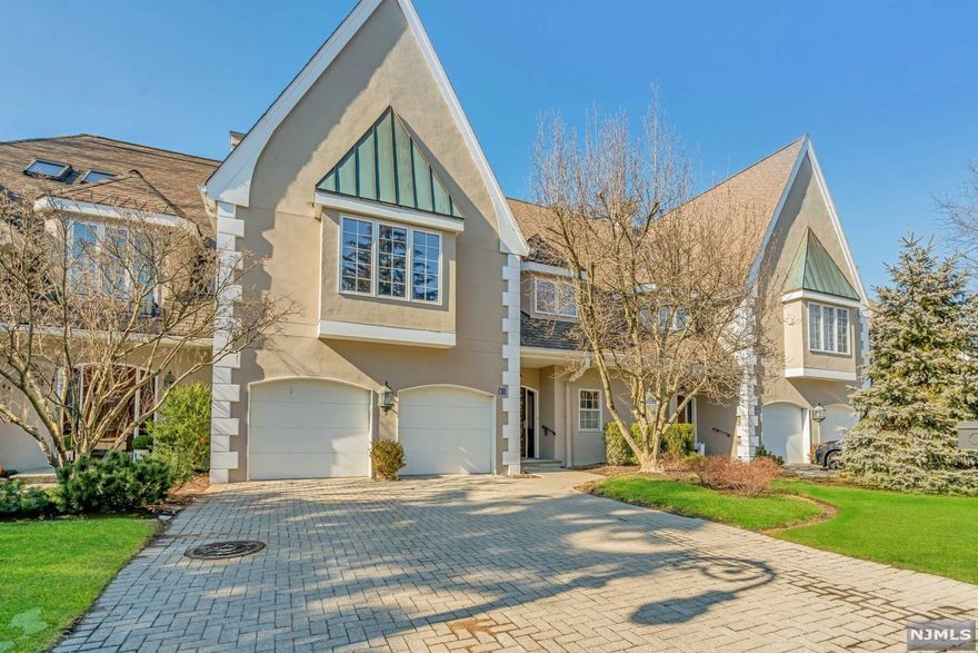 ALL NEW INTERIOR! Chic luxury townhome with over 3,500 sqft. across the 1st & 2nd level in Ho-Ho-Kus' prestigious Normandy Court. Enter into a bright open concept with superior flow and modern interior design features throughout. Eat-in-kitchen with new appliances, counters, fixtures, floors, and a trendy backsplash. Banquet-sized formal dining room with a statement light fixture, flows into a step-down living room w/ fireplace. Family room is off the kitchen, with french doors to a private backyard. Three ensuite bedrooms on the 2nd level, all with new spa-like, completely renovated bathrooms. Large master bedroom suite includes a dressing area, large walk-in, and two additional closets. Conveniently located laundry room on the 2nd level. Huge unfinished basement & equally large unfinished attic on the 3rd floor. Exterior recently painted to look fresh and new! Additional features include a heated garage, new hardwood floors, recessed lighting, smart thermostats.