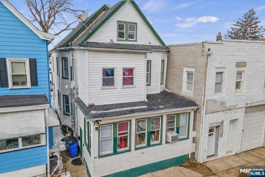 Welcome to this well-maintained two-home property in Passaic, offering space, versatility, and an unbeatable location. Featuring a total of 6 bedrooms and 2 full bathrooms, this property is ideal for owner-occupants or savvy investors.The first-floor unit offers three generously sized bedrooms, a comfortable living room, a dedicated dining area, and a functional kitchen perfect for everyday living and entertaining. The second-floor unit features three bedrooms, a bright living room, and a kitchen, providing excellent rental or multi-generational living potential.A partially finished basement adds valuable bonus space for storage, recreation, or future possibilities. Conveniently located near schools, parks, shopping, and public transportation, this home delivers both accessibility and long-term value.A fantastic opportunity to own a multi-unit property in a high-demand area don't miss it!