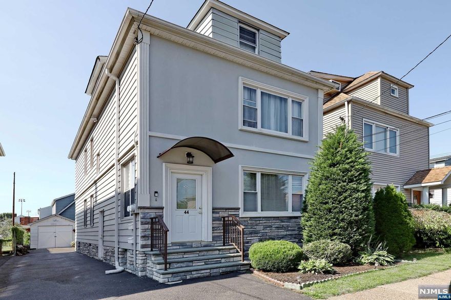 Immaculate two-family home with modern updates, ideal for investors or those seeking additional rental income. First-floor apartment: 2 bedrooms, Living room, dining area, kitchen, and full bathroom - Excellent rental history, current tenant is on month to month lease. Second-floor apartment (connected to the third floor): Large 1 bedroom Full bath, spacious living and dining rooms, and a modern kitchen with custom cabinets, granite counter tops and stainless steel appliances Hardwood floors and open layout Third floor: 2 additional bedrooms and a half bath Additional highlights: Fully finished basement with full bath, family room, laundry room, and plenty of storage. Separate utilities for both units One-car garage and a well-kept yard Prime location close to schools, parks, stores, and bus stop to NYC Not in a flood zone, with numerous updates throughout. Completely move-in ready This home offers both convenience and investment potential!