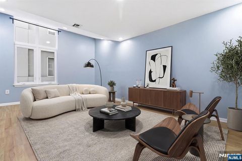 Photo of 308310 Passaic Avenue #215, Harrison, NJ 07029 (MLS # 26011599)