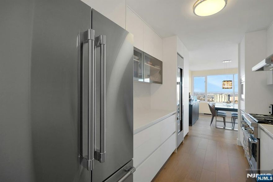 CONTACT DEBRA JACOBS (201) 803-3191 & HALLEY NATKIN (917) 626-8240 COLDWELL BANKER FORT LEE...DIRECT FOR MORE INFORMATION AND A PRIVATE TOUR! Horizon House Towers | Fort Lee Co-op | 3BR/2.5BA Renovated Ranch â€” Over 2,100 Sq Ft, Two Terraces For those who expect more, this delivers. Over 2,100 sq ft of top-to-bottom renovated, ranch-style living at Horizon House â€” three bedrooms, two-and-a-half baths, two terraces, and designer finishes throughout. Nothing to update. Nothing to fix. Just move in. Chef's kitchen with Thermador appliances, custom cabinetry, and a wine cooler. Wood plank flooring throughout. Every bathroom fully renovated custom walk-in showers, floating vanities, Porcelanosa tile, and designer hardware that earns the word spa. Custom closets and built-ins throughout. Two terraces for morning coffee and evening wind-down. Garage parking transfers with the unit. This is what a completed renovation looks like. No contractors. No decisions. No waiting. Try finding 2,100 sq ft of turnkey luxury in Manhattan for one all-inclusive payment. One monthly fee covers everything utilities, taxes, parking, cable, internet, and amenities. No surprise bills. A portion is potentially tax deductible Amenities include: 24-hour doorman and security; Two outdoor pools; Tennis courts; Gym; 28 acres of landscaped grounds Minutes to Manhattan. Move in and start living differently.