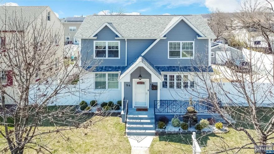 Complete transformation Cape offering 6 bedrms, 5 new baths, new modern EIK w/crisp white cabinets, SS appliances,backsplash and gleaming hardwoods. This remarkable home has been completely updated from top to bottom with all the bells and whistles .NOT TO MENTION A BONUS ROOM. HOUSE IS A DOUBLE LOT ADDRESS 54 RARITAN (TAXES 1848) AVE AND 56-58 RARITAN AVE (TAXES 11929.94)