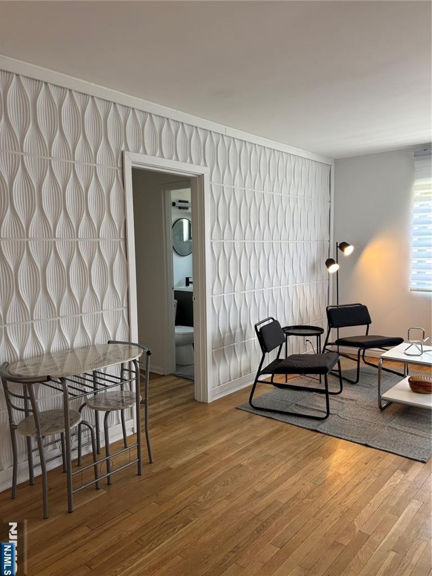 Updated furnished studio in highly desirable Linwood Park Co-Op Complex!!! The unit features an open layout with beautiful hardwood floors, a Modern Kitchen and Modern Full Bathroom, as well as a Murphy Bed which is great for space saving. It's a Bright and Spacious unit with lots of natural sunlight and an abundance of closet space. Super convenient location with NYC Transportation at your doorstep, and just a few blocks away from Linwood Plaza shopping mall featuring, H-mart grocery store, Restaurants, CVS Pharmacy, UPS, FED EX, Banks, Doctor's Offices, and more!!! Very low monthly maintenance fee of $391 which includes Taxes, Heat, Water, Hot Water, and Common Area Charges and Cable. Available parking for up to 3 Cars per unit for $17/mo per car. Subject to Board Approval. $350 non-refundable application fee and $500 refundable move-in fee deposit. Board Requires 2-years Tax Returns, 3 Months of Paystubs, Employment Verification Letter, Credit Report, and a 3:1 Income/Debt Ratio!!! Don't miss out on this rare find at a Great Price!!!