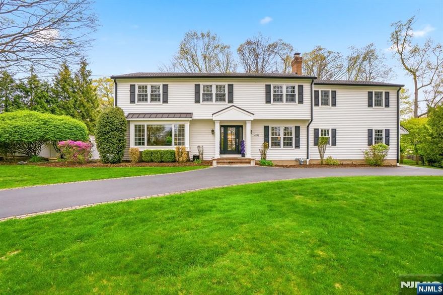 Welcome home to this exceptional, lovingly cared for 6 bedroom/3 Bath Center Hall Colonial home nestled in the highly sought-after Scotch Hills neighborhood! This home is set on just under an acre of pristine manicured grounds offering exceptional privacy. A spacious 3600+sq ft home, thoughtfully expanded & significantly renovated in 2019, adding 800+sqft, including a primary suite. Beyond the luxurious finishes, the transformation included a complete upgrade to plumbing & electrical systems. Open floor plan with abundant natural light throughout. Modern kitchen with ss appliances & oversized center island with seating, providing an exceptional layout for entertaining. The kitchen & dining area overlook the picturesque views of the yard & saltwater pool. Featuring five bedrooms upstairs, complemented by a sixth bedroom/bonus room on main level offering versatility. The second floor showcases five well appointed bedrooms all designed with custom closet built-ins. The oversized primary suite offers two generously scaled closet suites both enhanced with custom built-in systems. Well designed luxurious primary bathroom too. Truly a private retreat featuring a blue stone patio, a saltwater in-ground pool, & an asphalt basketball court. The full unfinished basement boasts high ceilings and offers endless possibilities! Oversized 2-car garage, a whole house generator, & sprinkler system. A rare opportunity to own a truly special home in one of the areaâ€™s most coveted neighborhoods